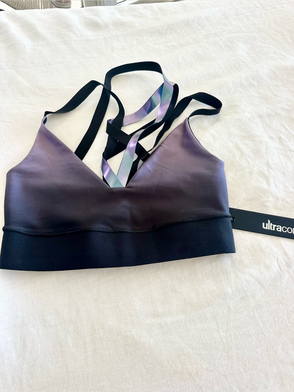 ultracor iridescent purple and black strappy sports bralette